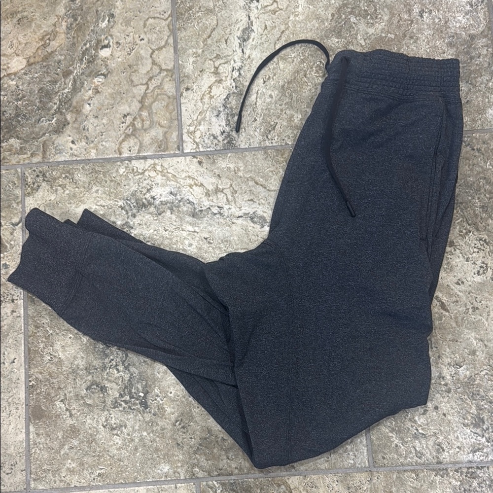 Lululemon Black Sweatpants with Stretchy Fabric and Wide Waistband